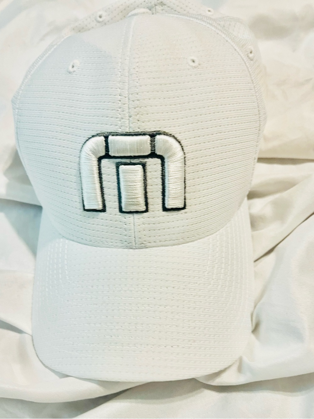 Travis Mathew Flex Fit White Golf Hat with Black-Trim Logo